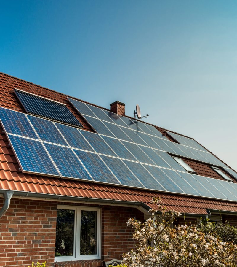 Solar panel on a red roof
